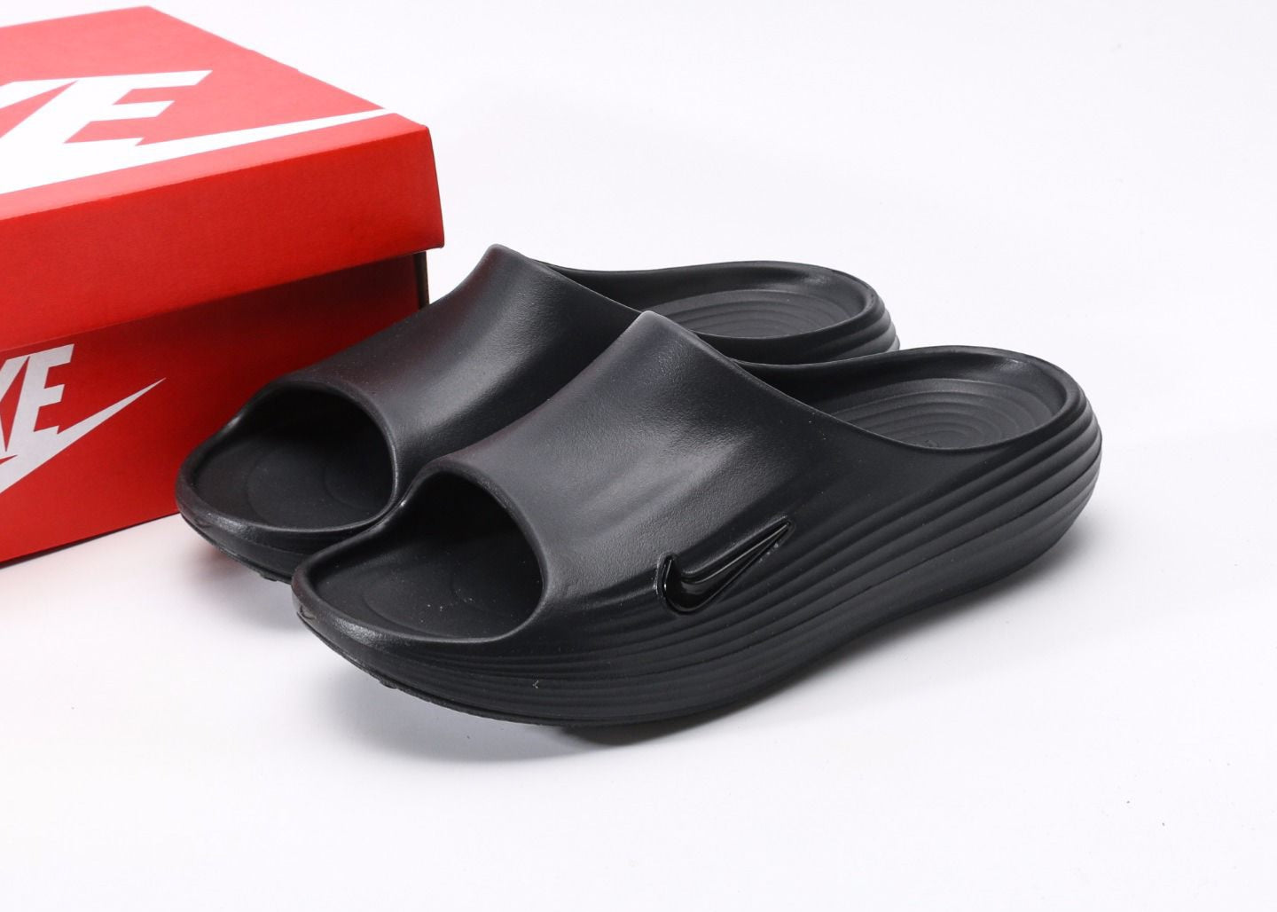 Nikee ReactX Rejuven8 Slides "Triple Black"